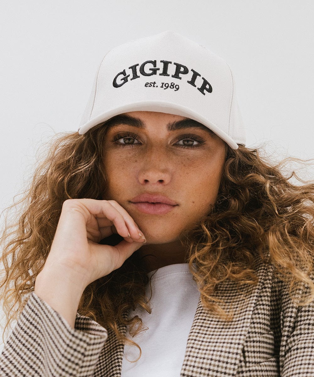 Gigi Pip trucker hats for women - Gigi Pip Canvas Trucker Hat - 100% Cotton Canvas w/ cotton sweatband + reinforced from panel with 100% polyester mesh trucker hats with gigi pip embroidered on the front panel with an adjustable velcro bag [cream]