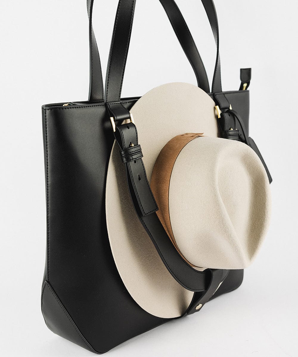 Gigi Pip luxury hat carrying totes for women - Leather Hat Carrying Tote - 100% genuine leather hat carrying tote featuring a "U" strap to cradle your hat to your bag + two interior pockets [black]