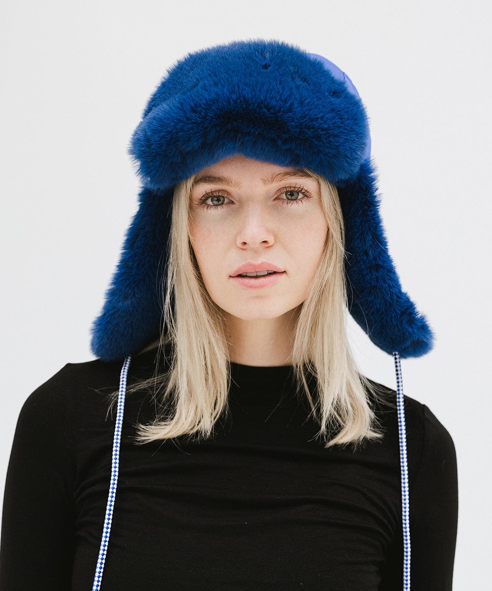 Gigi Pip winter hats for women - Leda Trapper Hat - 100% faux fur + polyester classic style inspired trapper hat featuring a retro limited edition holiday Gigi Pip logo [alpine blue]