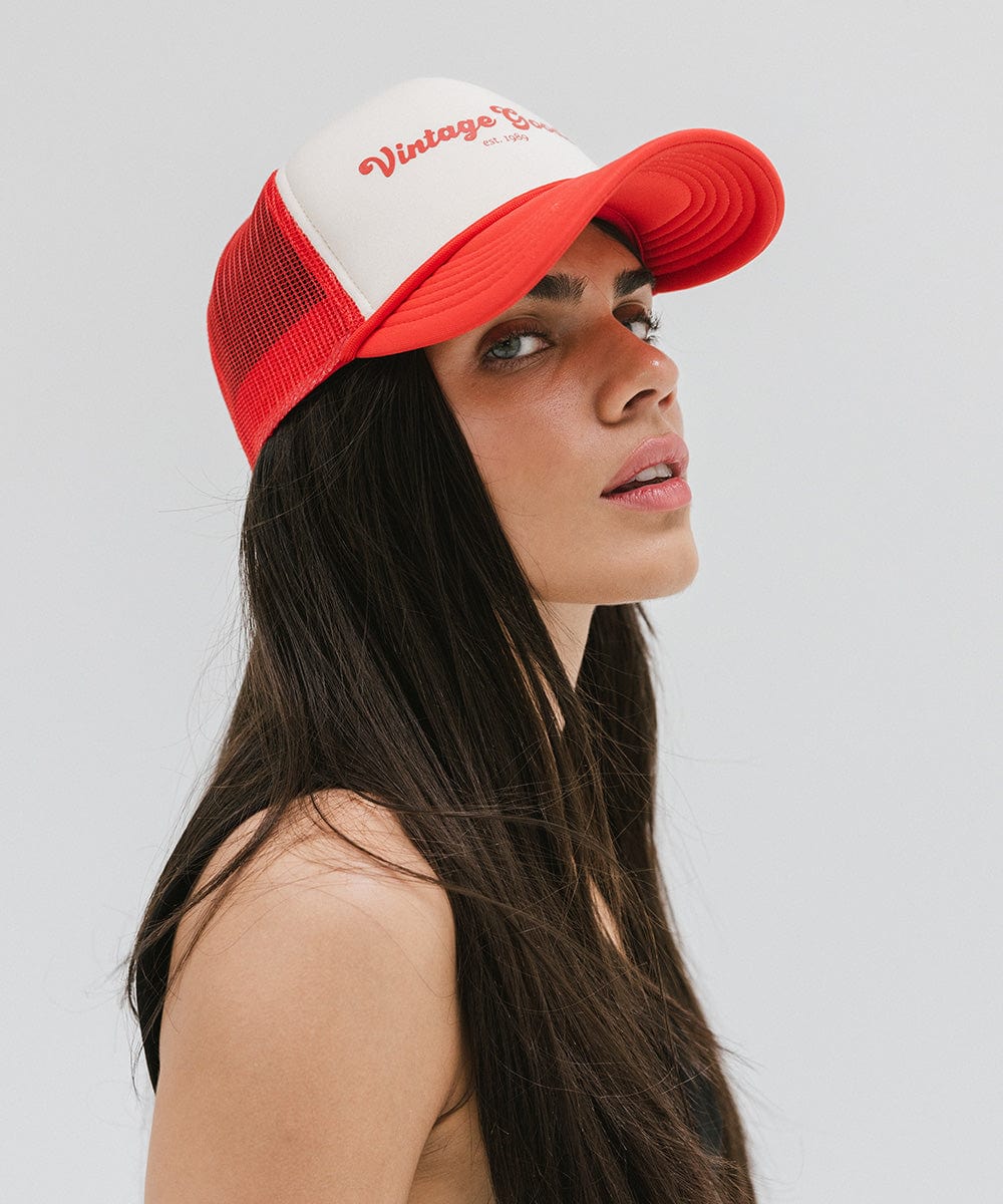 Gigi Pip trucker hats for women - Vintage Goods Foam Trucker Hat - 100% polyester foam + mesh trucker hat with a curved brim featuring the words "vintage goods" in a contrasting color as a design across the front panel [cream-vintage red]