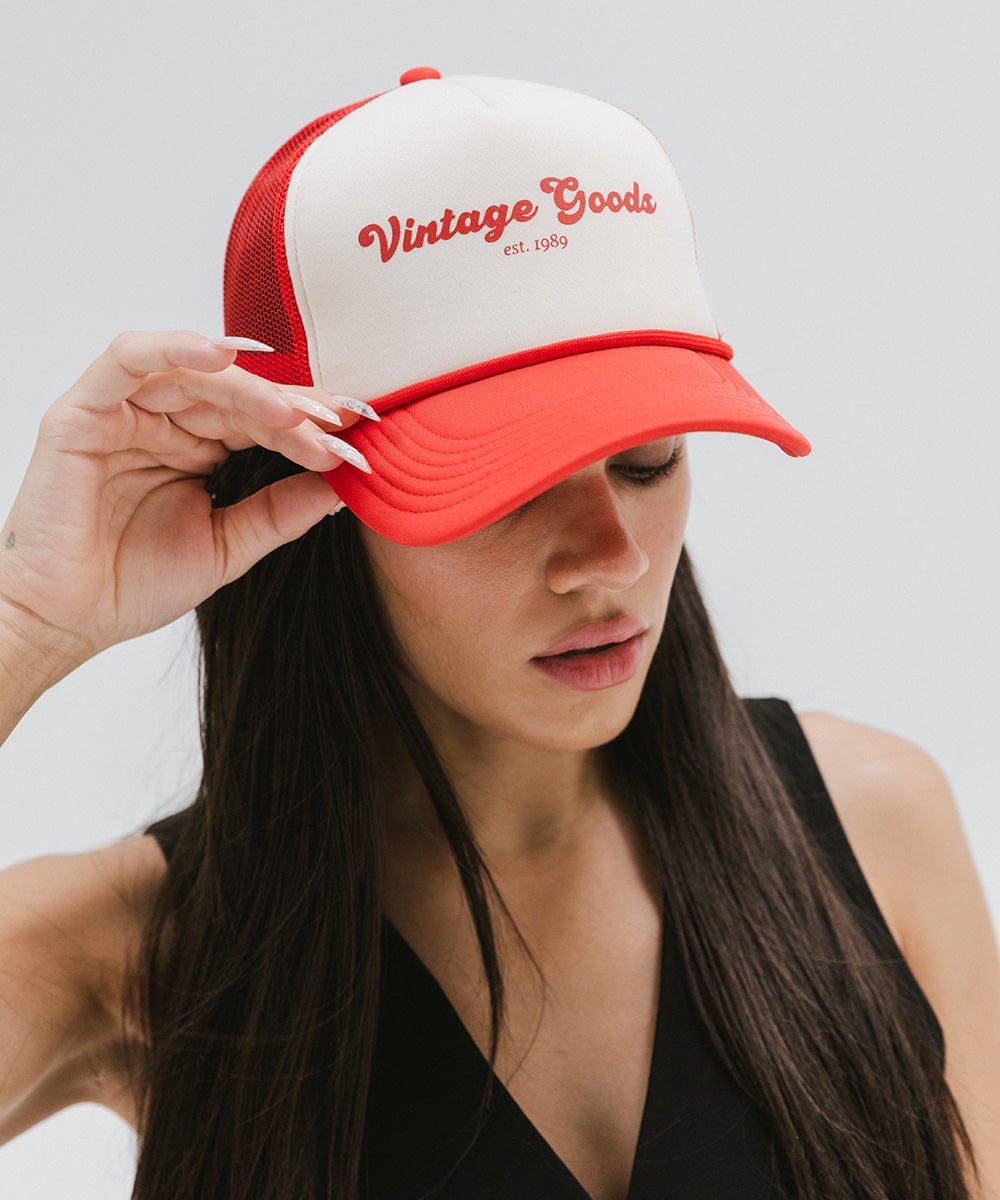 Gigi Pip trucker hats for women - Vintage Goods Foam Trucker Hat - 100% polyester foam + mesh trucker hat with a curved brim featuring the words "vintage goods" in a contrasting color as a design across the front panel [cream-vintage red]